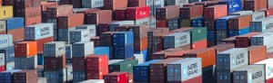 Stacks of international freight containers on a port quay